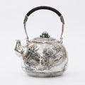 925 Sterling Silver Artisanal Silver Teapot Featuring Intricate Lotus Pond Engravings and Hammered Texture - Handicraft