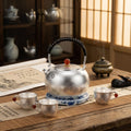 Pure 999 Fine Silver Elegant Handcrafted Silver Teapot with Red Agate Knob and Floral Engravings - Handicraft