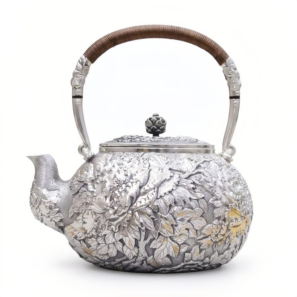 Pure 999 Fine Silver Handcrafted Silver Teapot with Intricate Floral Relief and Rattan-Wrapped Handle - Handicraft