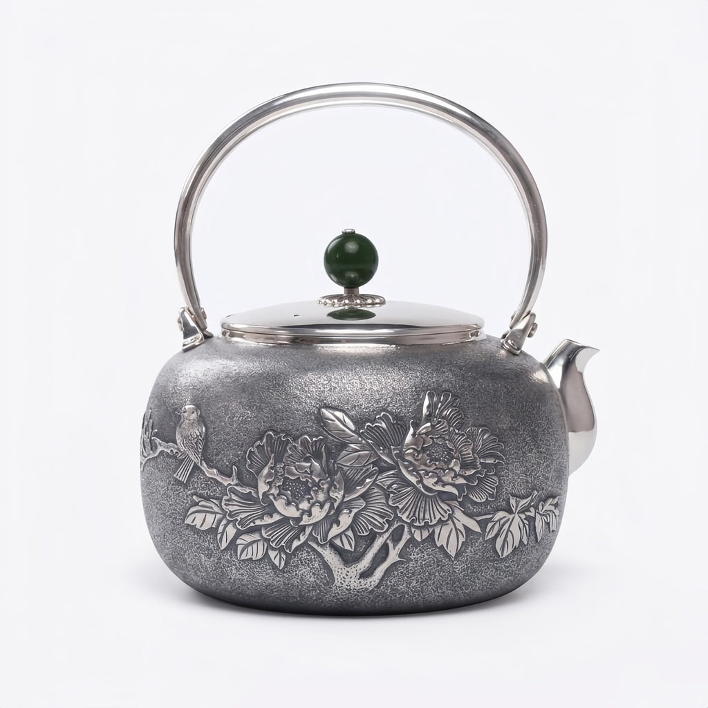 Pure 999 Fine Silver Handcrafted Silver Teapot Featuring Intricate Peony and Bird Relief with a Green Jade Finial - Handicraft