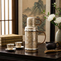Pure 999 Fine Silver Elegant Hand-Hammered Metallic Thermos Set with Intricate Floral Motifs and Cord-Wrapped Handles - Handicraft
