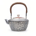Pure 999 Fine Silver Elegant Hand-Carved Silver Teapot with Intricate Floral Engravings and Cord-Wrapped Handle - Handicraft