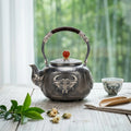 925 Sterling Silver Vintage Hammered Silver Kettle Featuring Ornate Bull Mask Design and Red Bead Finial - Handicraft