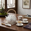 Pure 999 Fine Silver Exquisite Handcrafted Silver Teapot with Intricate Peony Engravings and Woven Rattan Handle - Handicraft
