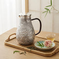 Pure 999 Fine Silver Exquisite Hand-Carved Silver Floral Pitcher with Intricate Peony Relief and Rattan-Wrapped Handle - Handicraft
