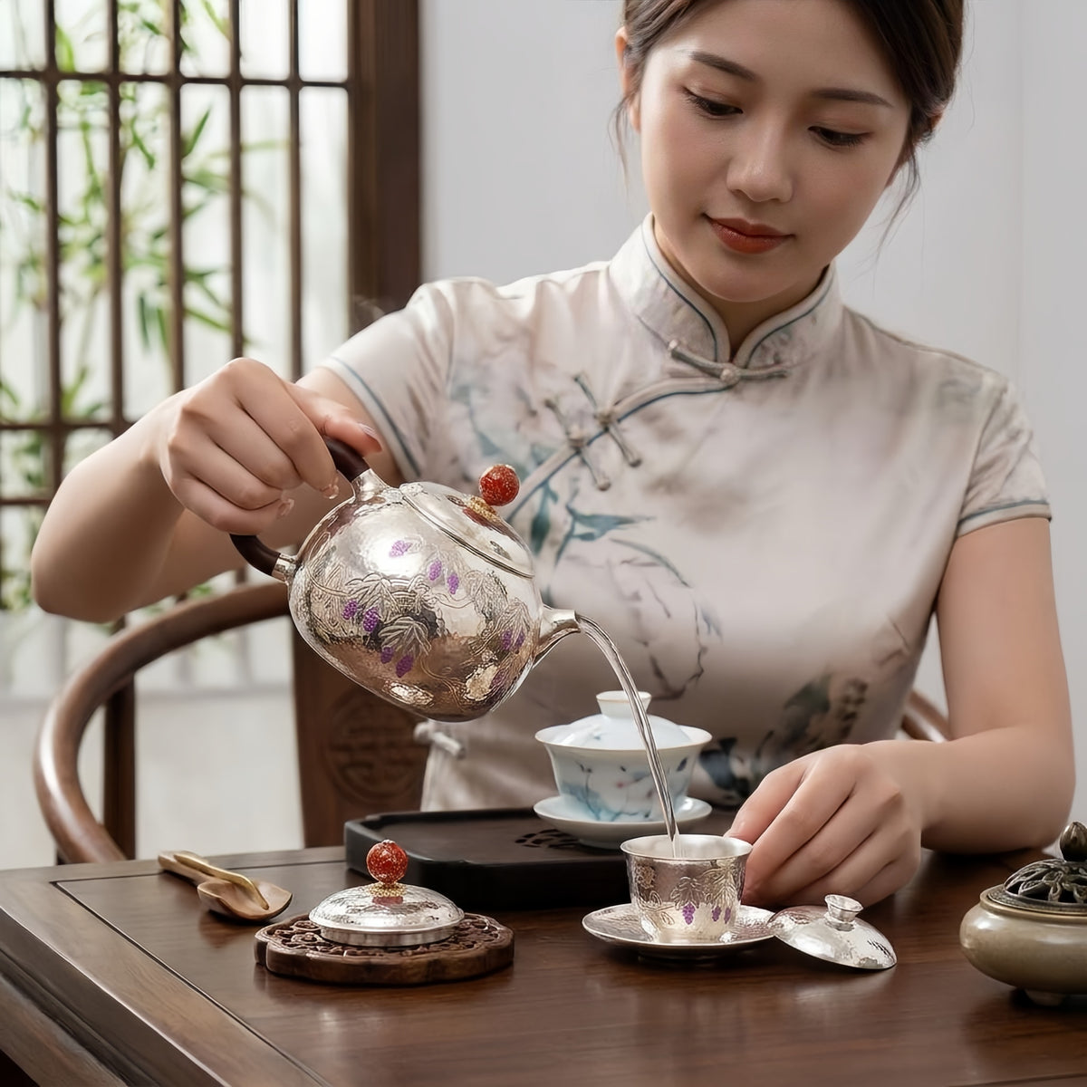 Pure 999 Fine Silver Ornate Hammered Silver Teapot with Purple Grape Motifs and a Wooden Handle - Handicraft