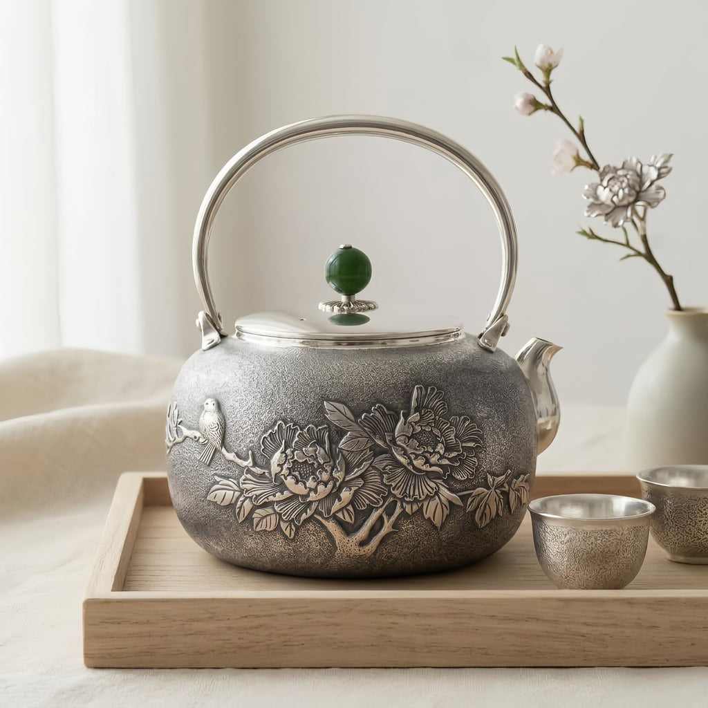 Pure 999 Fine Silver Handcrafted Silver Teapot Featuring Intricate Peony and Bird Relief with a Green Jade Finial - Handicraft