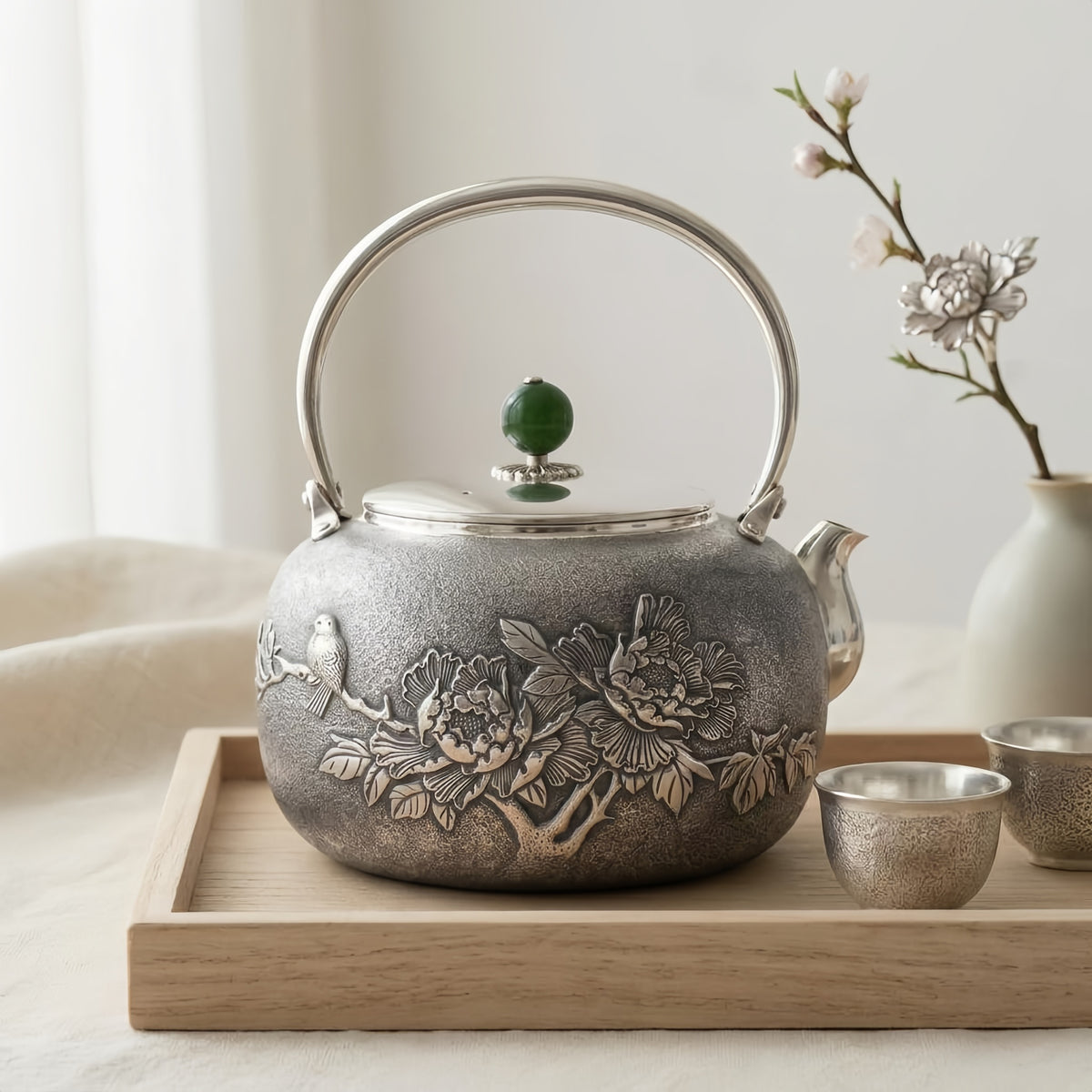 Pure 999 Fine Silver Handcrafted Silver Teapot Featuring Intricate Peony and Bird Relief with a Green Jade Finial - Handicraft