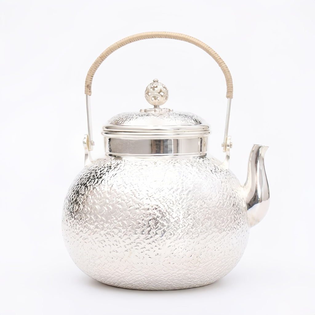 Pure 999 Fine Silver Handcrafted Hammered Silver Teapot with Rattan-Wrapped Handle and Filigree Finial - Handicraft
