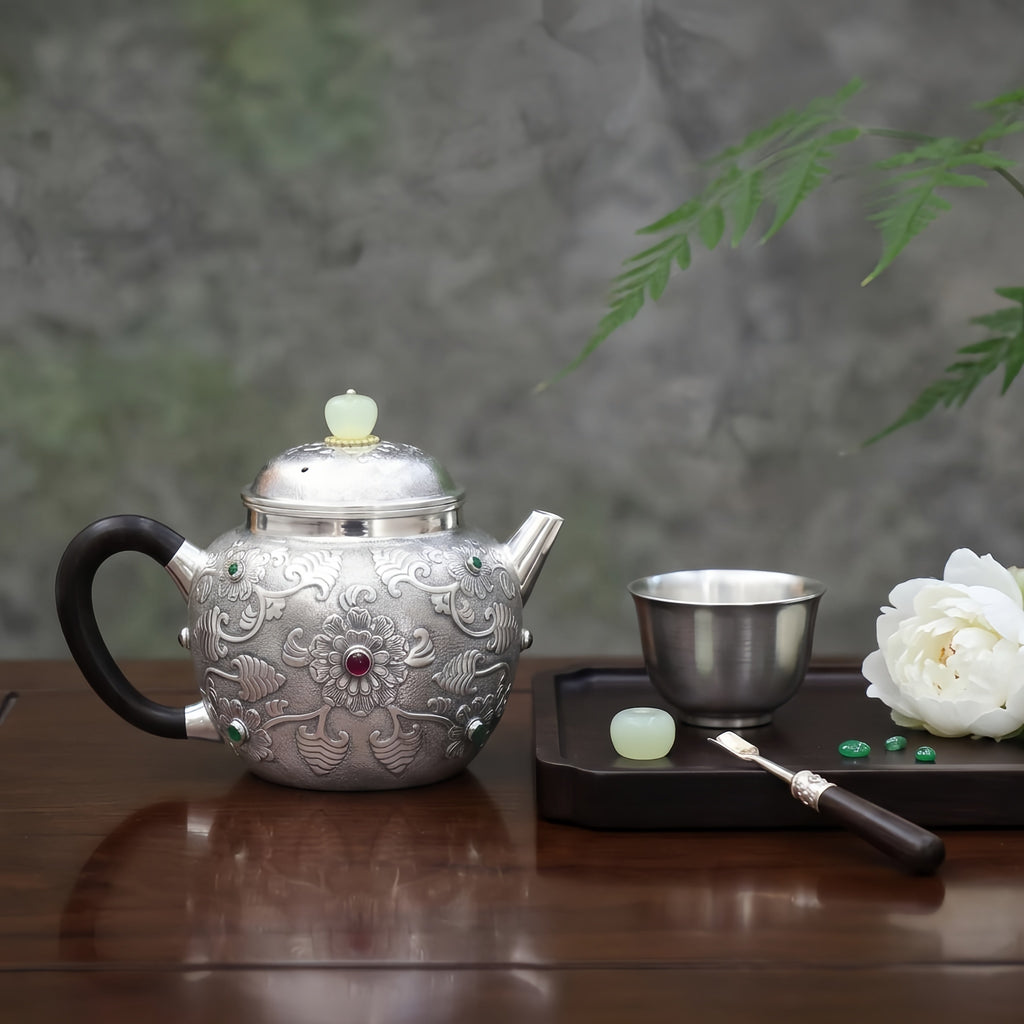 Pure 999 Fine Silver Ornate Handcrafted Silver Teapot with Floral Embossing and Vibrant Gemstone Accents - Handicraft